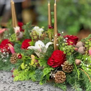Festive Red & Green Christmas Centrepiece, flower delivery Nairobi by Upendo Blooms